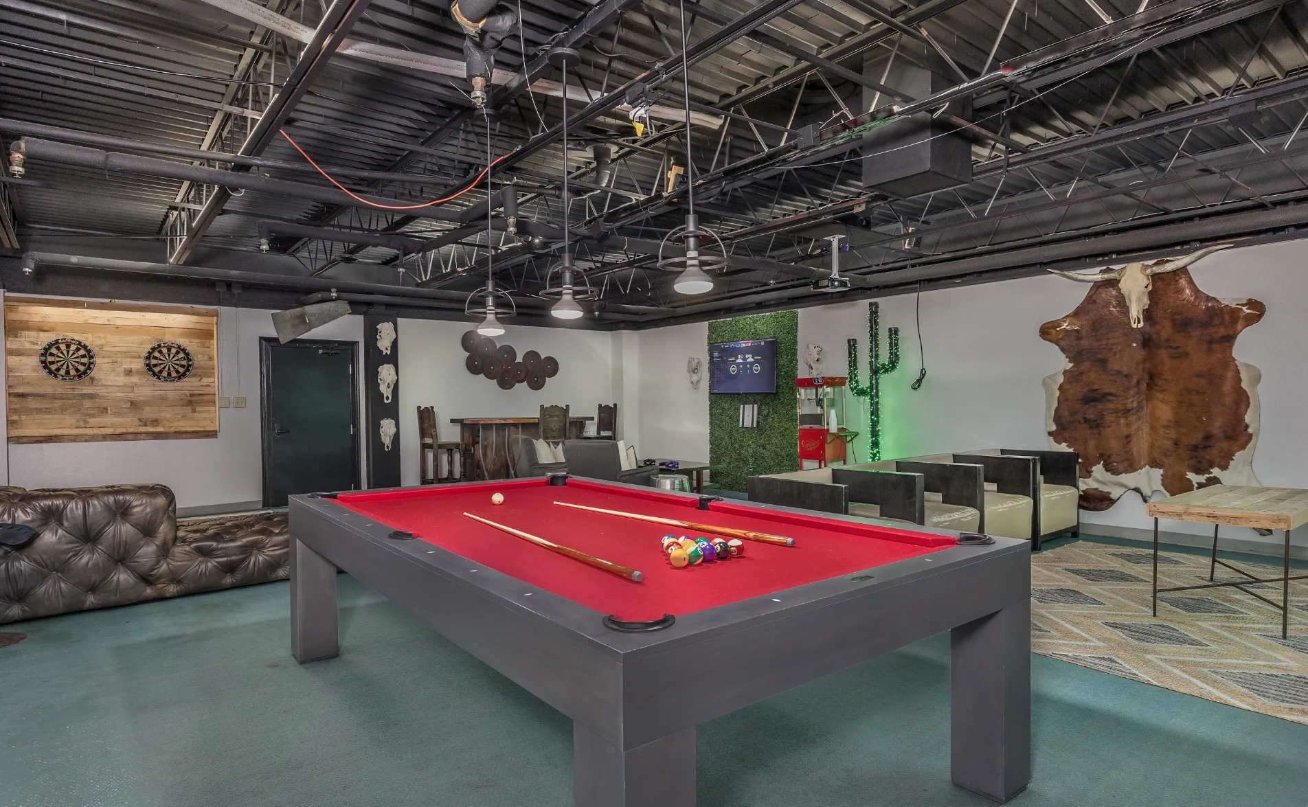 The game room with its red-felt pool table