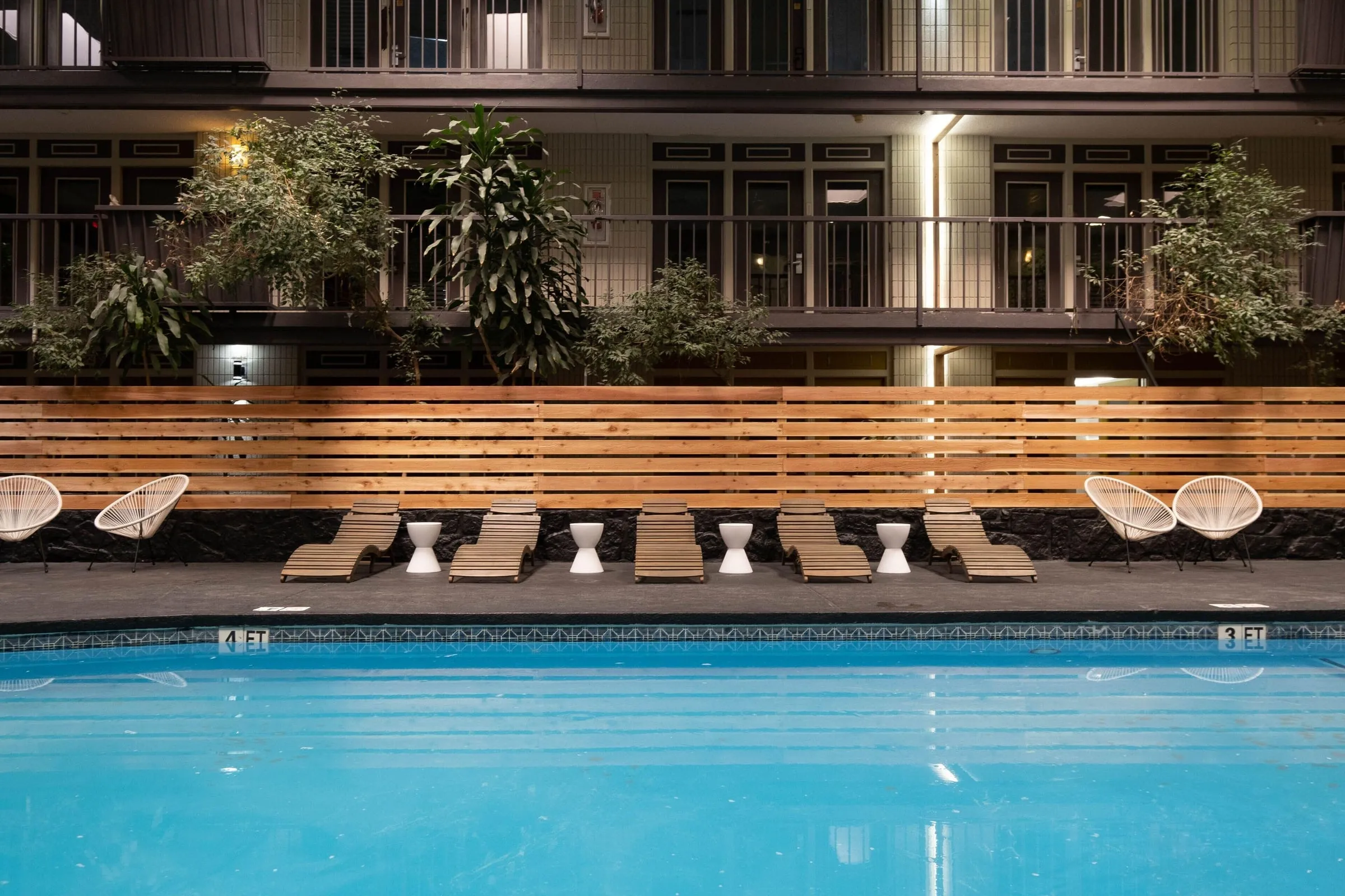 The heated indoor pool with loungers along the deck